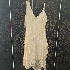 Never worn, ivory colored lace dress to be used for wedding or summer event.